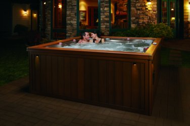 Couple Relaxing in Brown Hot Tub
