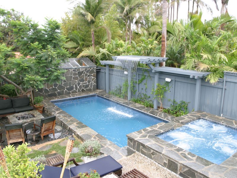 Rising sun pools and spas backyard pool and spa with waterfall
