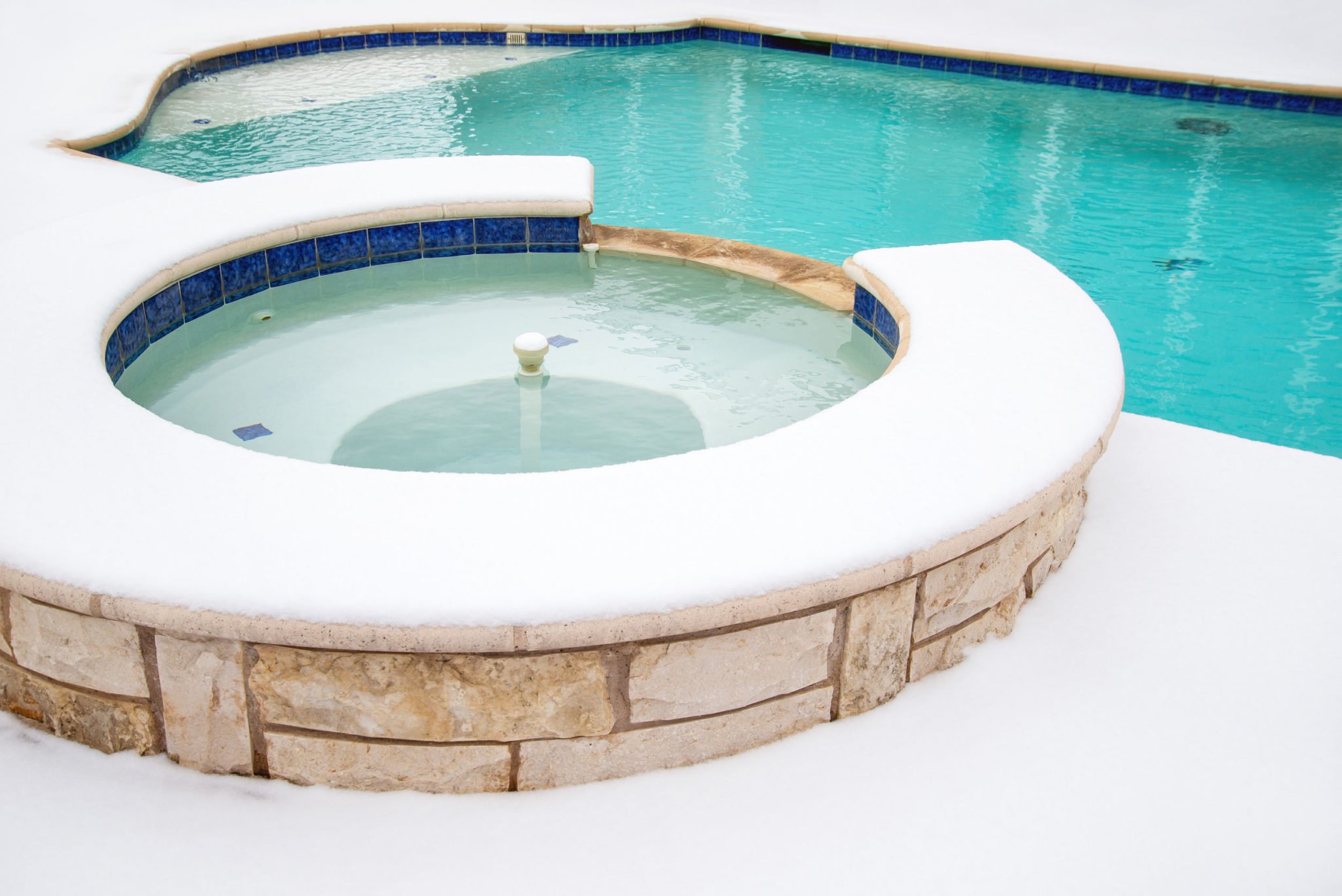 Snow Surrounding Swimming Pool and Hot Tub | Rising Sun Pools & Spas