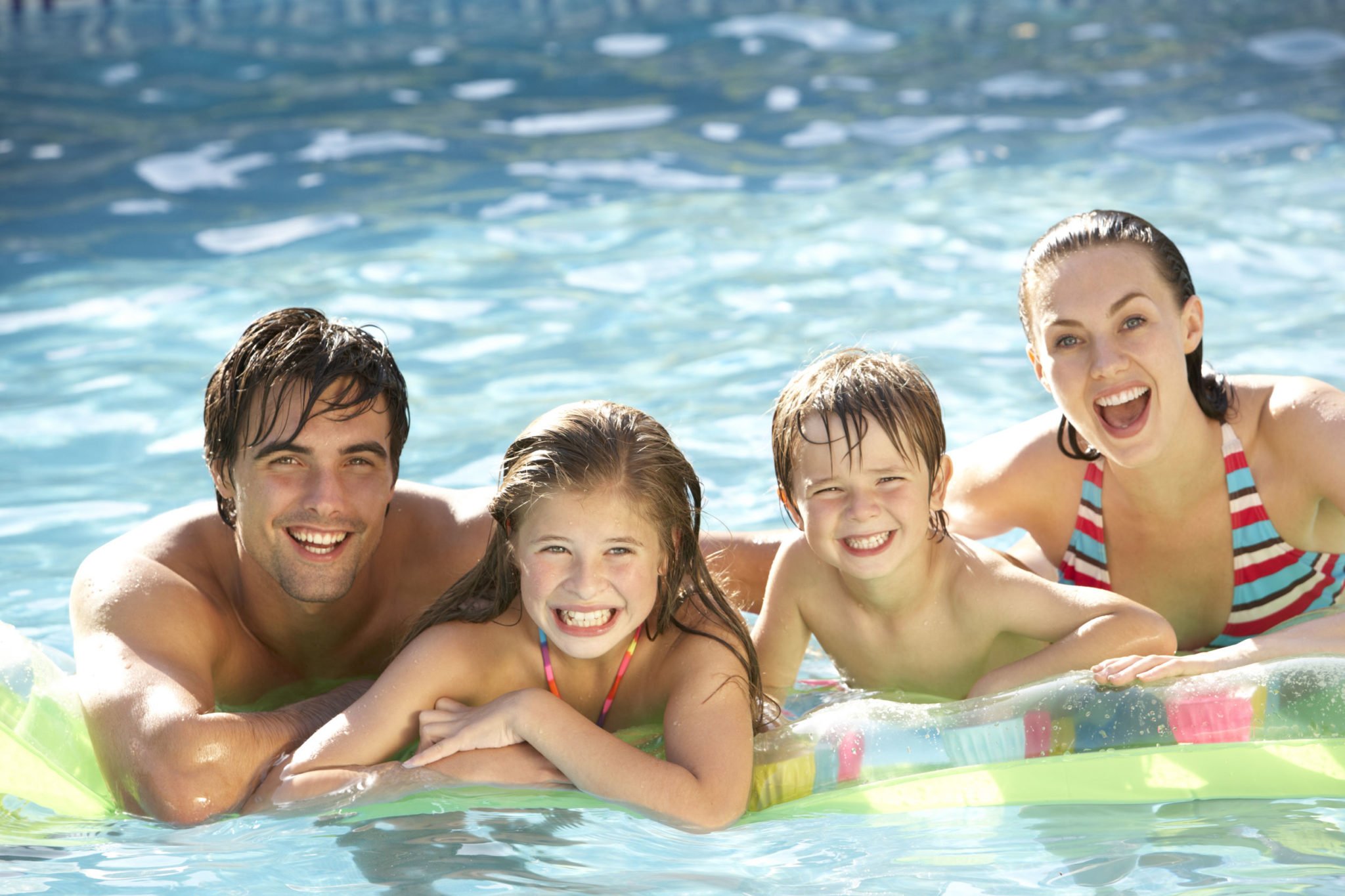 Family Swimming in Pool | Rising Sun Pools & Spas